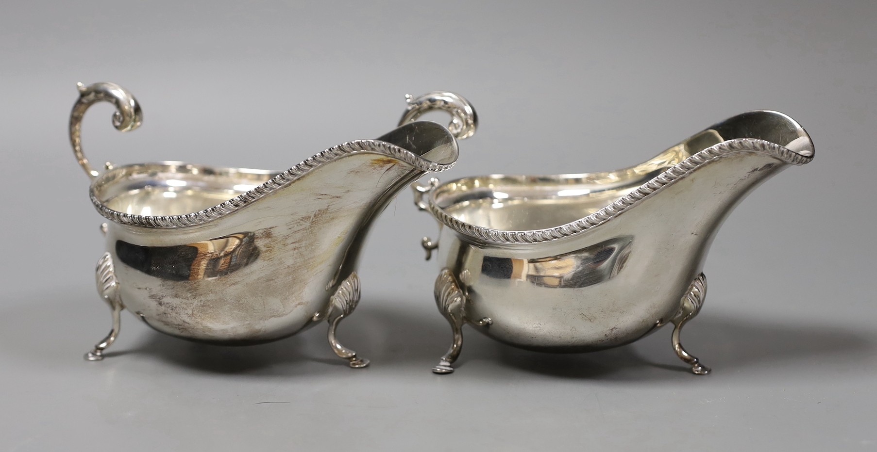 A pair of 1960's silver sauceboats by Garrard & Co, London, 1964, 11.7oz.